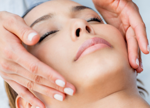 a smiling relaxed lady receiving the perfect peel